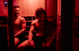 NattyPLUS founders sharing a laugh in a sauna