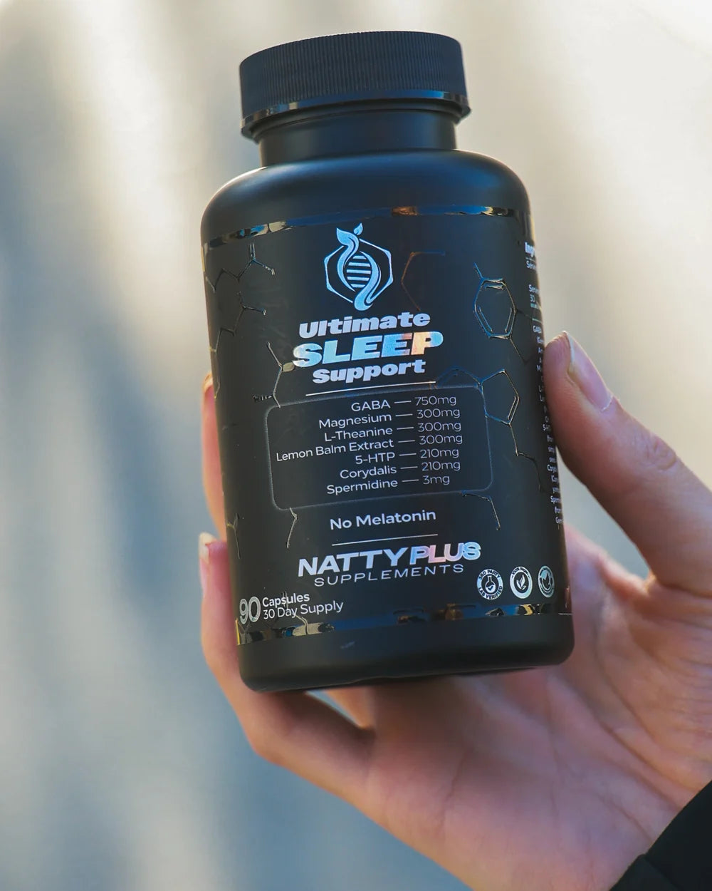 Ultimate Sleep Support held in hand