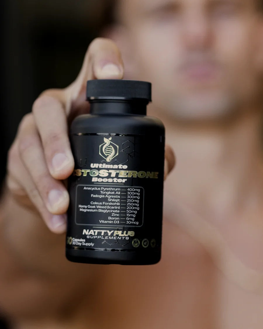 Ultimate Testosterone Booster in hand