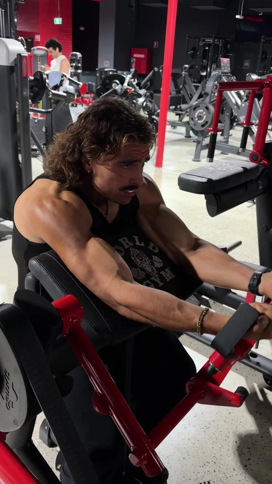 Rambo training preacher curls at World Gym
